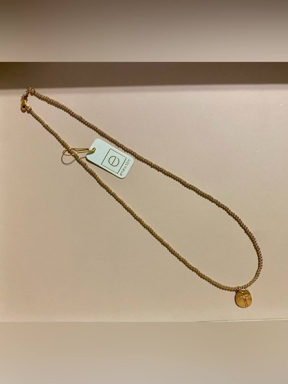 enewton 17” Gold Beaded Necklace with a Cross Pendant